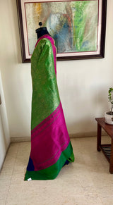 SAANJH- GREEN KATAN BANARASI SAREE WITH PINK PURPLE BORDERS