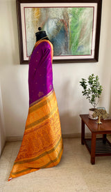 TANUSHREE- VIBRANT MAGENTA BOMKAI WITH RUDRAKSHA AND FLORAL DETAIL