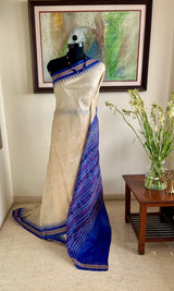 SUSHRITA – CREAM KHANDUA TUSSAR WITH RUDRAKSHA BORDER AND BANDHA AANCHAL