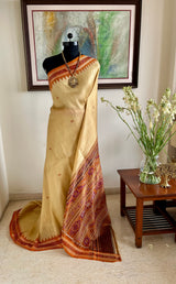 RUPALIKA – BEIGE AND BROWN KHANDUA TUSSAR WITH BANDHA AANCHAL