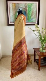 RUPALIKA – BEIGE AND BROWN KHANDUA TUSSAR WITH BANDHA AANCHAL