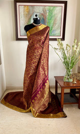 PRANIKA- MAROON KANJIVARAM SAREE WITH VERTICAL GOLD ZARI FLORALS AND PAISLEYS