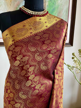PRANIKA- MAROON KANJIVARAM SAREE WITH VERTICAL GOLD ZARI FLORALS AND PAISLEYS