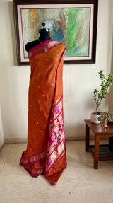 PARISHI- RUST BROWN PAITHANI WITH ZARI PEACOCK AANCHAL