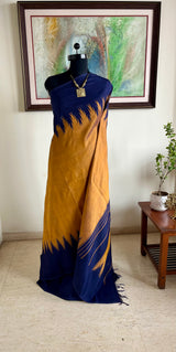 SUBHIKA- GOLDEN MUSTARD KANJIVARAM WITH NAVY TEMPLE BORDERS