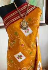 IRAVI- MUSTARD POCHAMPALLY IKAT SAREE WITH FLORAL AND BUTTERFLY MOTIFS
