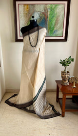 YAMIKA – CREAM AND BLACK VIDARBHA TUSSAR WITH TEMPLE BORDERS