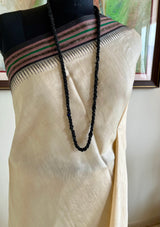 YAMIKA – CREAM AND BLACK VIDARBHA TUSSAR WITH TEMPLE BORDERS