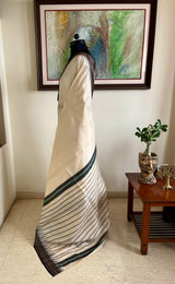 YAMIKA – CREAM AND BLACK VIDARBHA TUSSAR WITH TEMPLE BORDERS