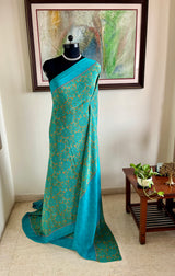 AANYA – DARK BEIGE CREPE SILK WITH BLUE FLORAL DETAILING