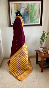 MAYURAKSHI – DEEP MAROON BERHAMPURI WITH MUSTARD RUDRAKSHA BORDER