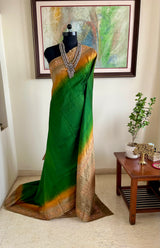 NINARIKA- A BEAUTIFUL GREEN BANARASI SILK SAREE WITH A BROWNISH OMBRE AND SEQUIN EMBROIDERY BORDER