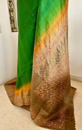 NINARIKA- A BEAUTIFUL GREEN BANARASI SILK SAREE WITH A BROWNISH OMBRE AND SEQUIN EMBROIDERY BORDER