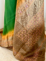 NINARIKA- A BEAUTIFUL GREEN BANARASI SILK SAREE WITH A BROWNISH OMBRE AND SEQUIN EMBROIDERY BORDER