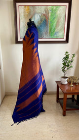 VAMIKA- ARNI SILK IN MOLTEN COPPER WITH NAVY TEMPLE BORDER