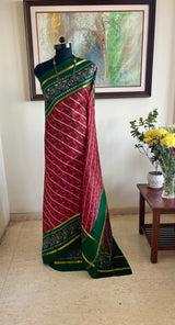 PRARTHI - RED PATOLA WITH SLANTED IKAT BODY AND GREEN BORDER