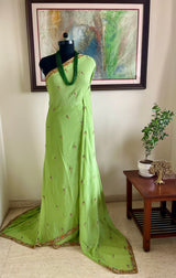 TRISHYA – GREEN PURE GEORGETTE SAREE WITH EMBROIDERY AND SEQUINS