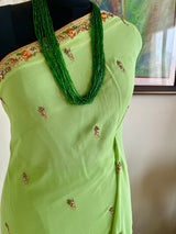 TRISHYA – GREEN PURE GEORGETTE SAREE WITH EMBROIDERY AND SEQUINS