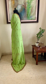 TRISHYA – GREEN PURE GEORGETTE SAREE WITH EMBROIDERY AND SEQUINS