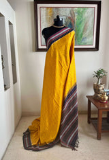 KAAMANA: VIBRANT YELLOW POCHAMPALLY WITH IKKAT AND STRIPED AANCHAL