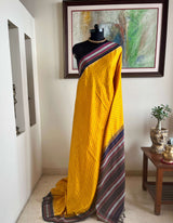 KAAMANA: VIBRANT YELLOW POCHAMPALLY WITH IKKAT AND STRIPED AANCHAL