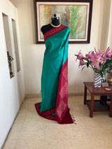 PRANJUSHA – TEAL POCHAMPALLY WITH MAROON IKKAT BORDER AND AANCHAL