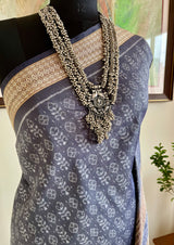 MALASHRI – BLACK SAREE WITH JHOTI AND BANDHA GRANDEUR