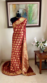 MOUVIKA – REDDISH MAROON KANJIVARAM WITH FLORAL ZARI DETAILING