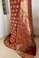 MOUVIKA – REDDISH MAROON KANJIVARAM WITH FLORAL ZARI DETAILING