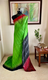 AKSHITA- GOPALPUR TUSSAR IN GREEN WITH TWIN TONE BORDER