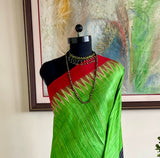 AKSHITA- GOPALPUR TUSSAR IN GREEN WITH TWIN TONE BORDER