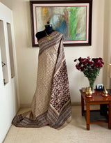 IRAAYA- UNIQUE BEIGE TUSSAR SILK WITH DROPLET AND SCRIPT MOTIFS