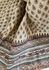 IRAAYA- UNIQUE BEIGE TUSSAR SILK WITH DROPLET AND SCRIPT MOTIFS