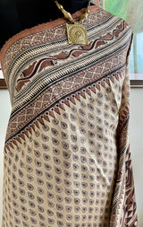 IRAAYA- UNIQUE BEIGE TUSSAR SILK WITH DROPLET AND SCRIPT MOTIFS