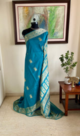 BIBRITI - TEAL COTTON SILK BALUCHARI WITH ARCHER AND RAMAYANA MOTIFS