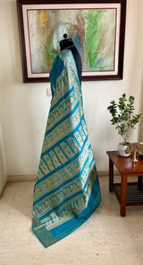 BIBRITI - TEAL COTTON SILK BALUCHARI WITH ARCHER AND RAMAYANA MOTIFS