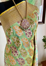VYANJANA - PISTA GREEN BANARASI WITH ZARI PAISLEY AND DIAMOND MOTIFS