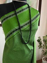 ANANTHI – A GREEN KANJIVARAM WITH ELEPHANTS AND ZARI CHECKS