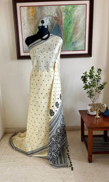 AIMEE – LIGHT CREAM ASSAM SILK WITH FLORALS AND PEACOCK AANCHAL