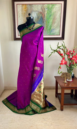 PRACHITI – PURPLE PAITHANI WITH GREEN NARALI BORDER AND ZARI PEACOCKS