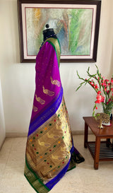 PRACHITI – PURPLE PAITHANI WITH GREEN NARALI BORDER AND ZARI PEACOCKS