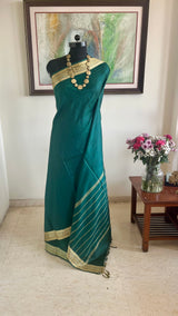 TEJASVI - GREEN KANJIVARAM SILK SAREE WITH FLORAL BORDER