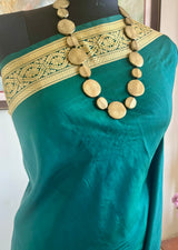 TEJASVI - GREEN KANJIVARAM SILK SAREE WITH FLORAL BORDER