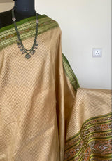 BIKHIPTA- TIMELESS ELEGANCE, BEIGE KHANDUA TUSSAR WITH REFRESHING GREEN BORDER