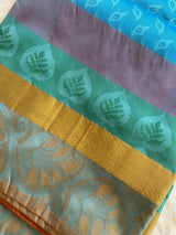 MEENA- A BLUE, SILK BLEND SAREE WITH COUNCH SHELL SHAPED MOTIFS, A MULTILAYERED BORDER AND BRIGHT RED AANCHAL