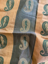 PRISHA- A SILK BLEND SAREE WITH ALTERNATING PATTERNS OF BEIGE AND GREY, PAISLEY MOTIFS WITHIN. AANCHAL HAS LARGER PAISLEYS WITH FLORAL DESIGNS