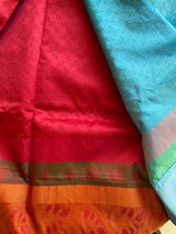 MEENA- A BLUE, SILK BLEND SAREE WITH COUNCH SHELL SHAPED MOTIFS, A MULTILAYERED BORDER AND BRIGHT RED AANCHAL