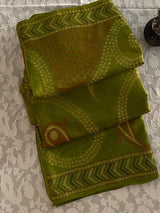 HARITA- A PISTA GREEN FINE MATKA SILK WITH DULL RUST AND CREAM COLOURED WEAVES