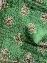 ARUSHI- A PRINTED PURE GEORGETTE IN GREEN WITH  EMBROIDERY AND SEQUIN WORK IN THE BODY, SEQUINED BORDER