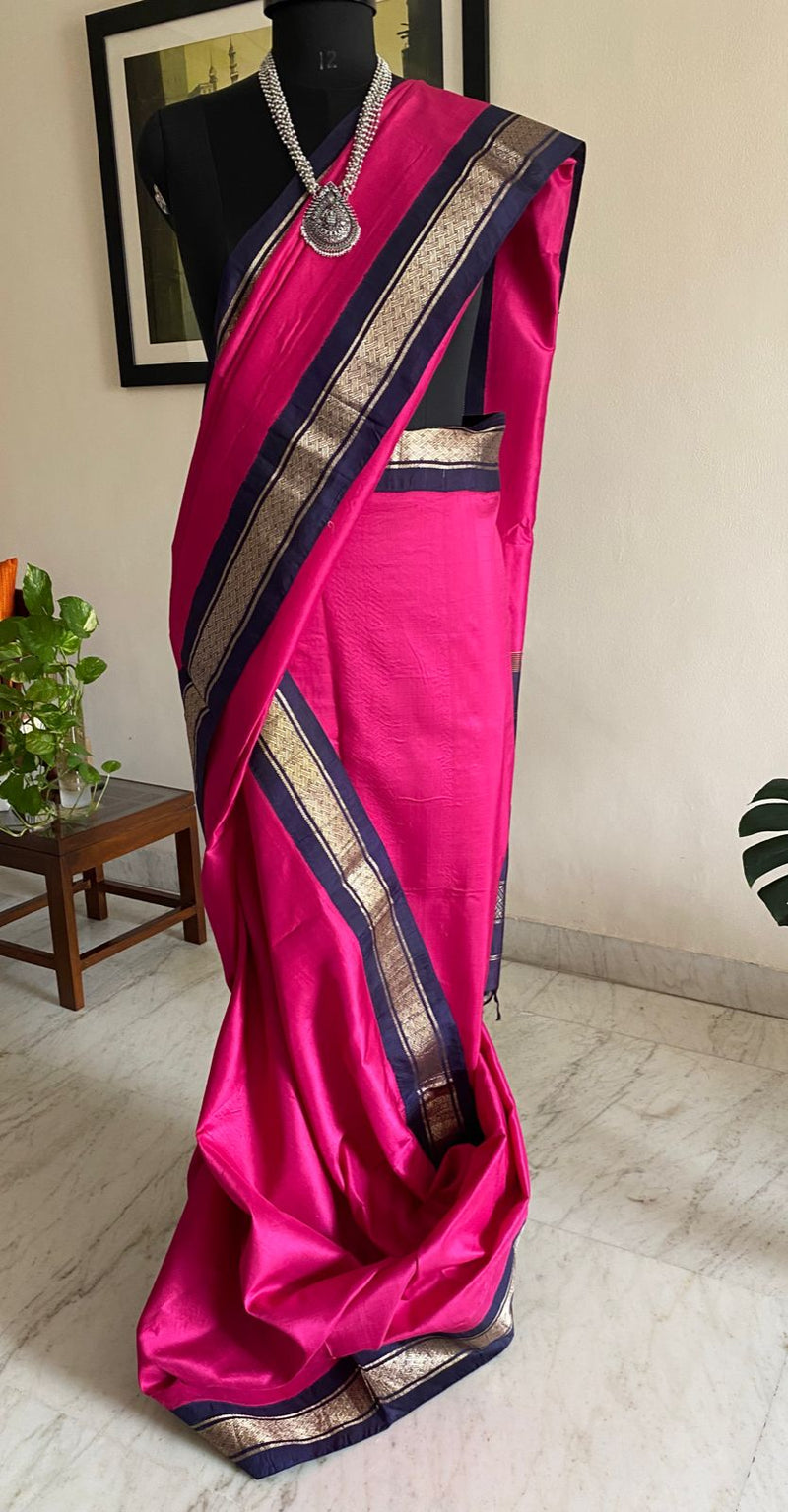 BHAVIKA- A BEAUTIFUL HANDLOOM KORVAI KANJIVARAM IN RANI PINK WITH NAVY BLUE  AND SILVER ZARI BORDER AND AANCHAL